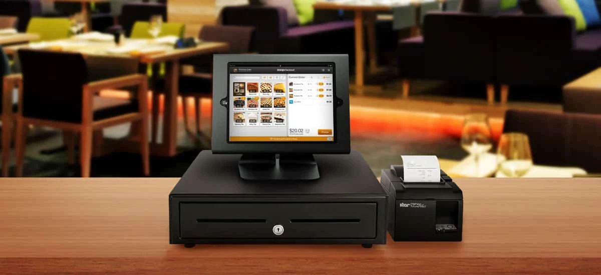 caixa registradora, tablet e impressora juntos usando Zoop Checkout como frente de caixa