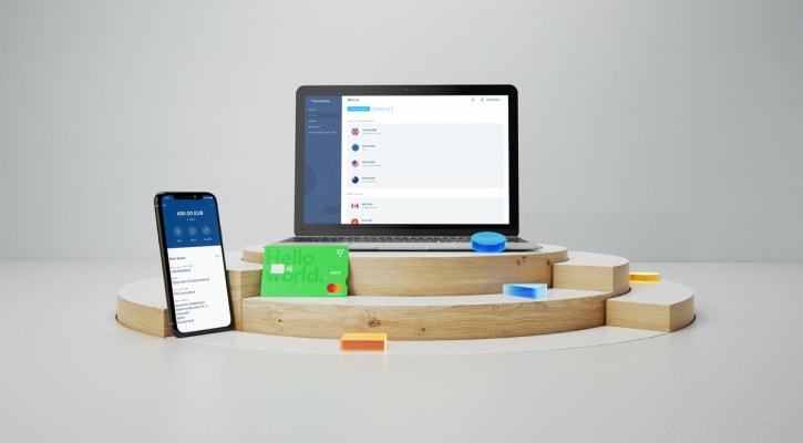 Ilsutração mostrando laptop e celular com o app Transferwire