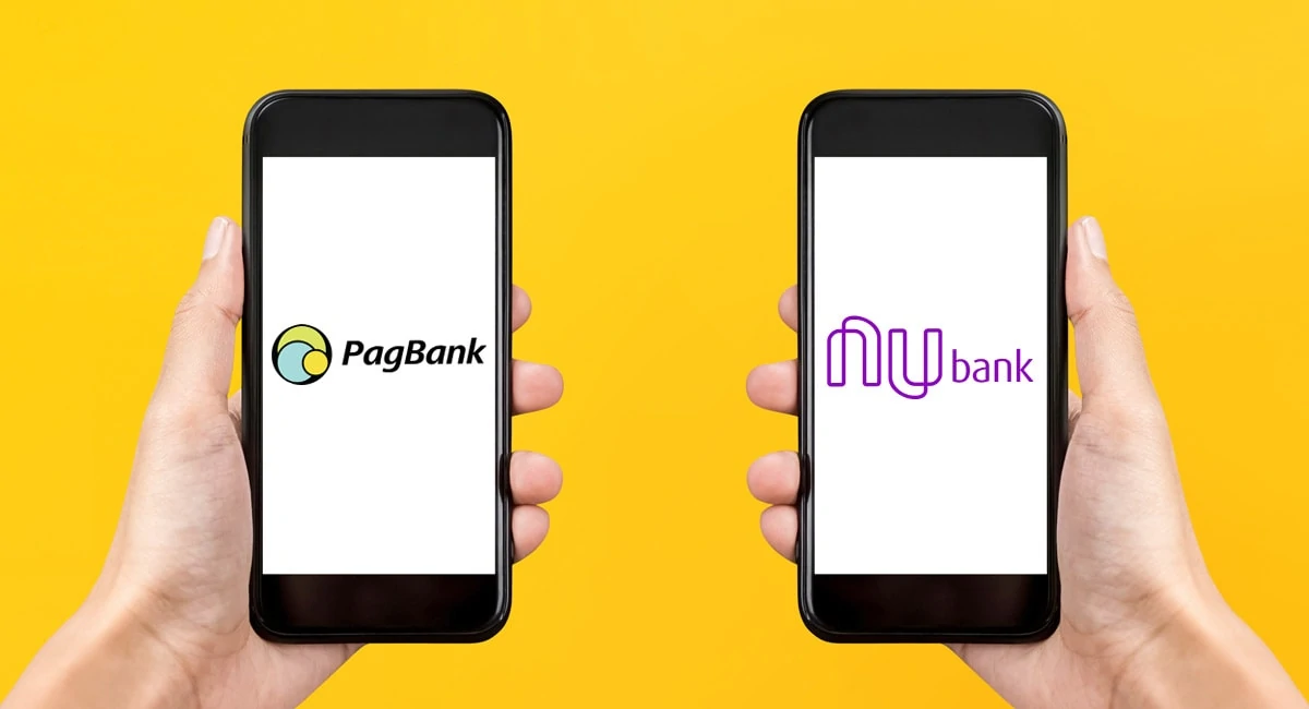 Mãos segurando celulares com logos do Nubank e PagBank na tela